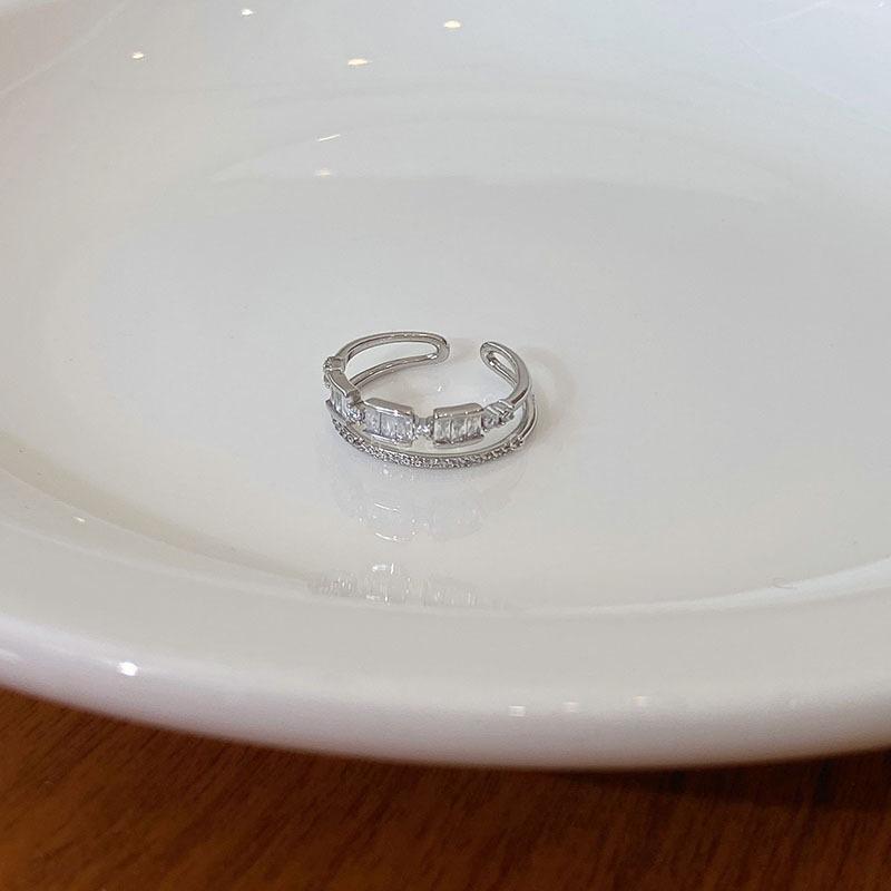 

Dazzling Gold White Plated Open Ring For Women Featuring Intricate Hollow Design And Fit Adjustable