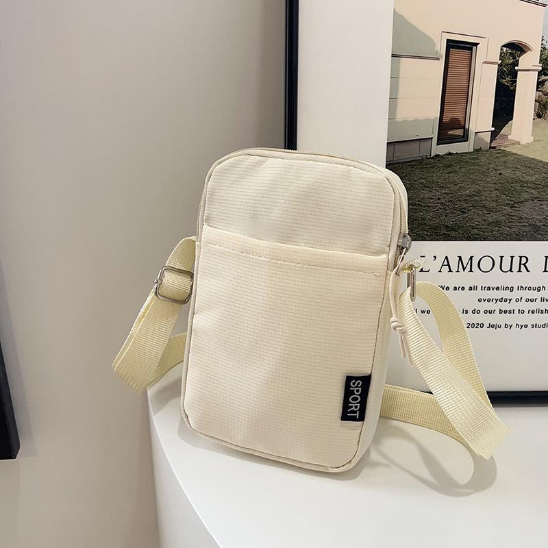 Multi-color mobile phone bag, large-capacity shoulder bag, simple and fashionable messenger bag, solid color change bag, nylon small backpack.