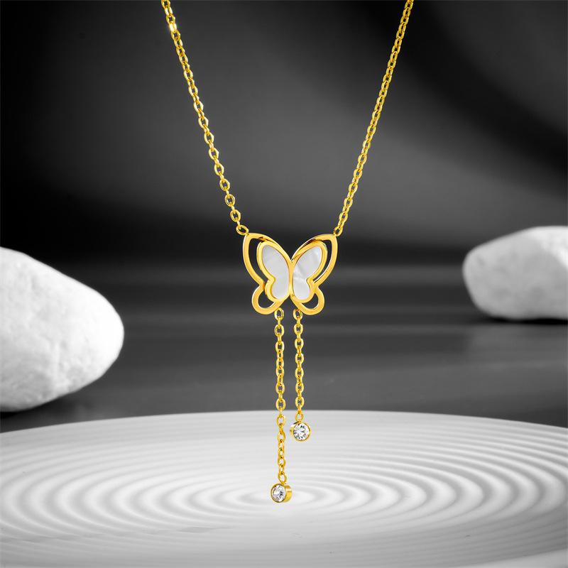 Stylish Titanium Steel Women's Necklace: Double-Layer White Shell with Rhinestone Butterfly Tassel, Hollow Design Collarbone Chain.