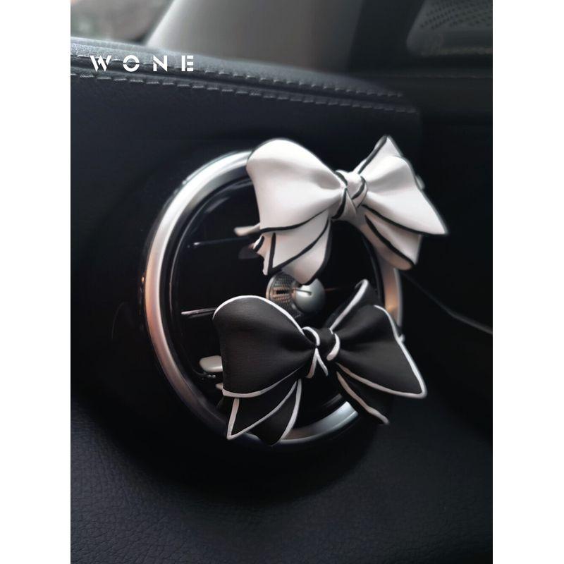 

Car Perfume Diffuser with Black and White Bow, Creative Air Vent Decoration for Car Air Conditioning White Bow with Black Edges Floral tone