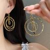 Bohemian round thread hollow multi-layer ear hook European and American cold wind earrings light luxury high-end earrings