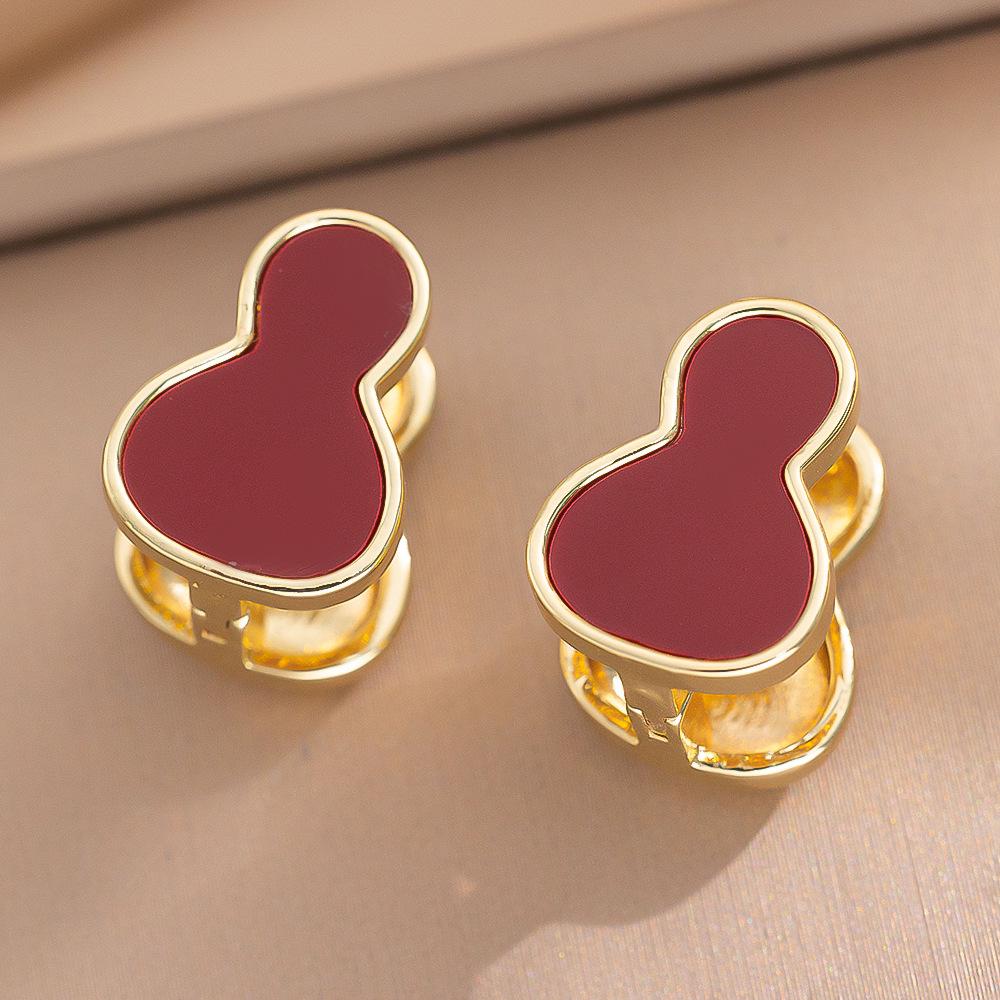 Eleganckie kolczyki sztyfty z cyrkoniami w kształcie koniczynki i misia - Nowy szykowny design