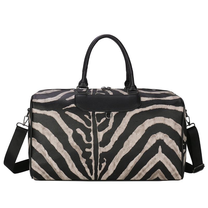 

New black and white striped fashion short-trip travel bag, portable sports and fitness bag, large-capacity luggage bag чёрный
