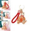 Elegant Cinderella Pumpkin Car Charm Keychain Accessory For Women With Metallic Finish And Colorful Ropes Ideal For Gifts And Special Occasions