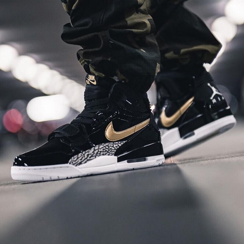 Jordan Legacy 312 Schwarz Gold Lack GS AT4040-007
