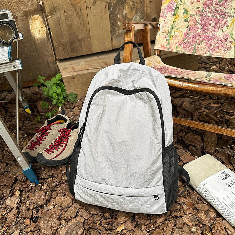 A Large Capacity Multi Functional Bag for Couples  A Lightweight Simple and Fashionable Travel Backpack