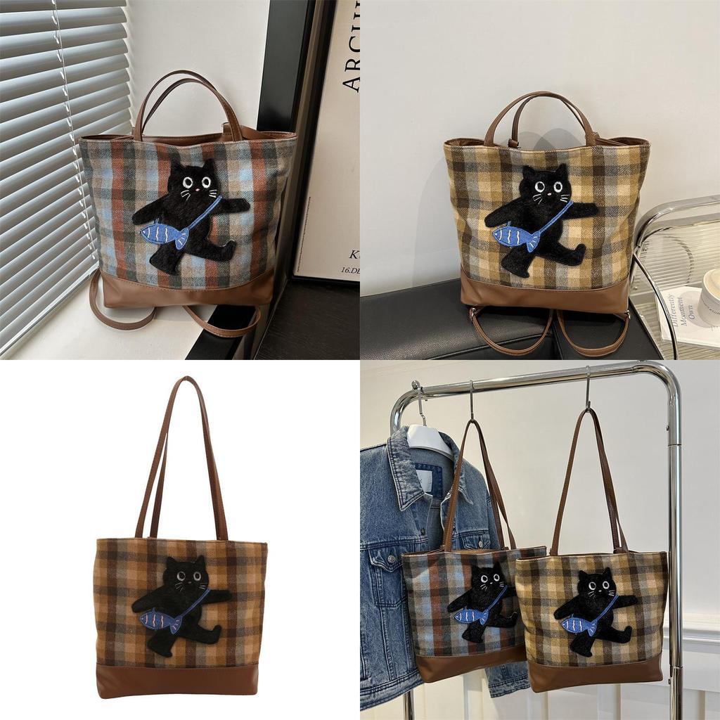Stilvolle, geräumige Schultertasche mit Cartoon-Motiv aus der Winterkollektion in Blau und Braun