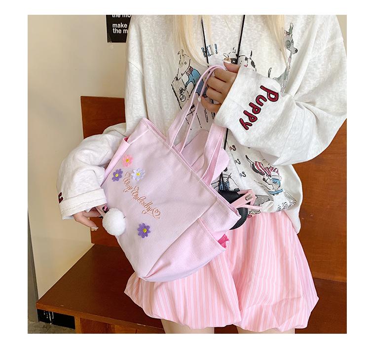 Roztomilá plátěná taška na oběd se zaječími oušky s květinovou melodií