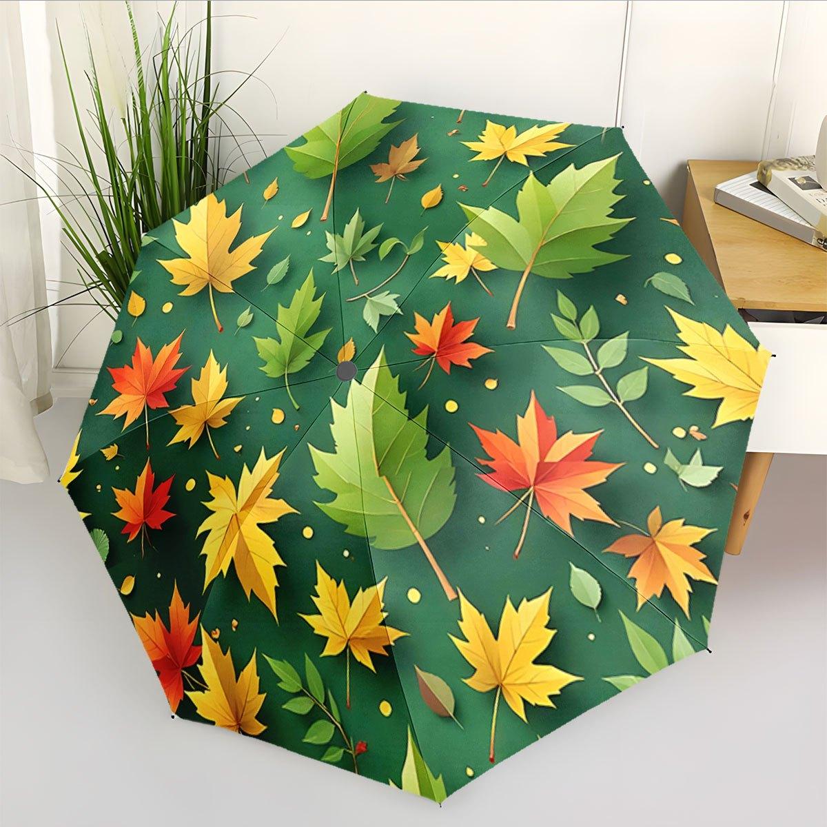 

Automatic Folding Umbrella Autumn leaves on a green background. Portable collapsible design, casual outdoor accessory, for all