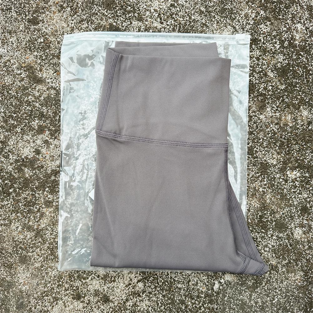 Solid Color High-Waisted Women's Yoga Leggings with Back Pocket – Soft, Elastic, and Peach Bum Enhancing