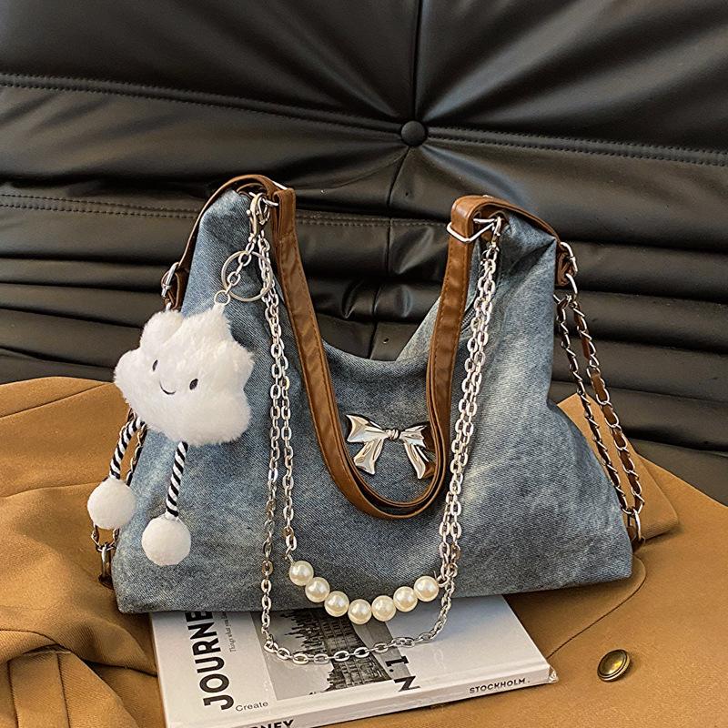 Tote bag women's 2025 new large-capacity commuter versatile chain shoulder schoolbag women's lightweight travel backpack