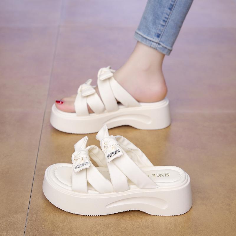 Bow stepping on shit slippers fairy fairy wind 2025 summer versatile one-word sandals thick-soled seaside beach sandals