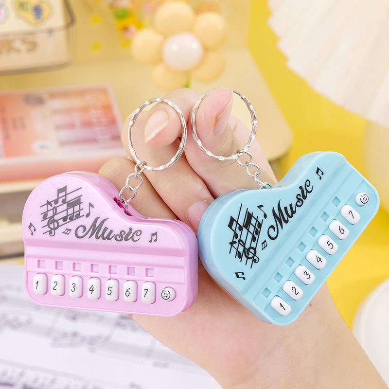Mini Handheld Luminous Electronic Piano Keychain for Kids