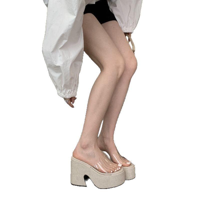 Giant legs! Muffin thick-soled thick-heeled open-toed sandals waterproof table transparent word with super high-heeled cool slippers women