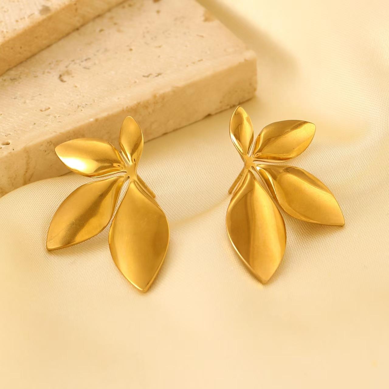 

Универсальные модные серьги-пусеты из нержавеющей стали в виде цветка и листа для женщин 1 pair(Needle in middle)