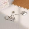 Y2K ვინტაჟური ვერცხლისფერი ფერი Bowknot Heart Keychain Fashion Bow Love Keyring ჩანთა გულსაკიდი გასაღების დასაკიდი დეკორაცია გოგონებისთვის საჩუქარი