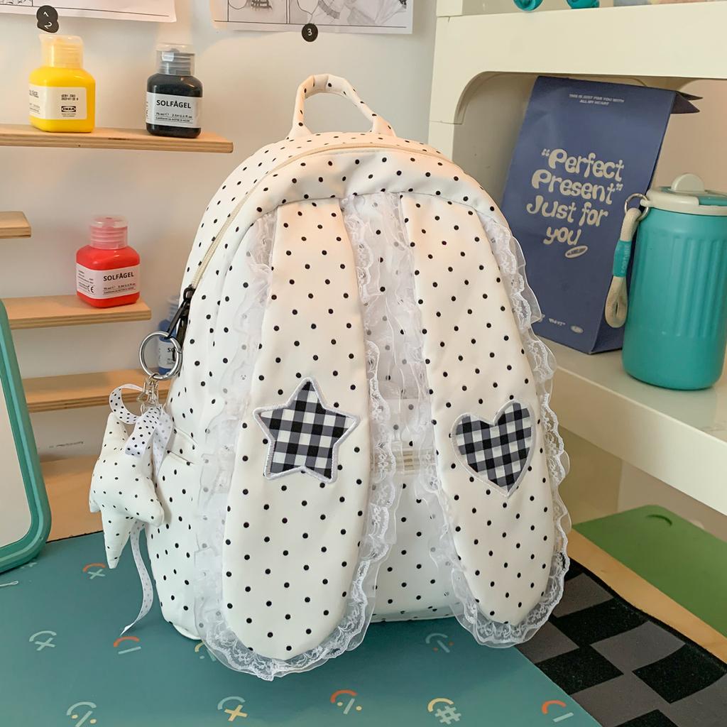 Schoolbag Korean simple foreign style polka dot love rabbit ear backpack 1011 summer new commuter student backpack