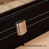 Schwarze Leder-Uhrenaufbewahrungsbox mit 12 Fächern und Perforationsmuster