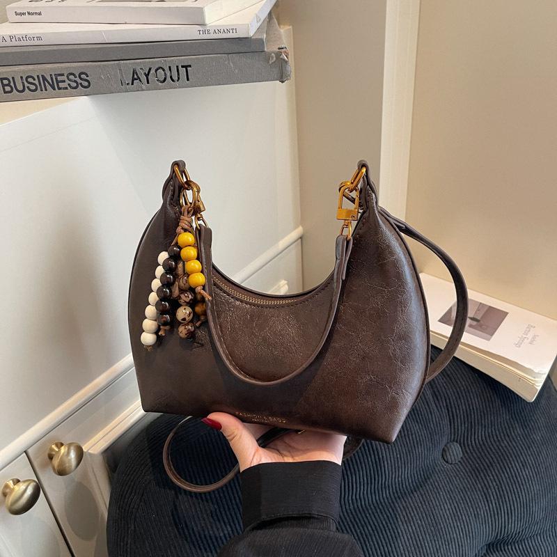 

Retro soft leather commuter armpit bag women s foreign versatile shoulder messenger bag 2025 new hand-carried baguette bag [Send pendant]