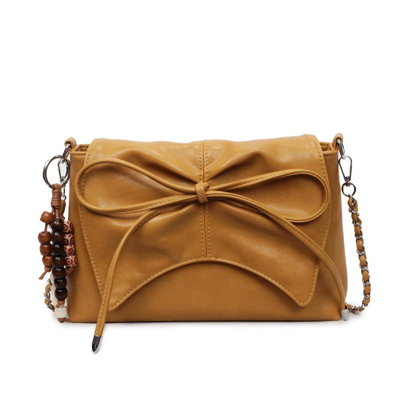 

High-value large-capacity bag women s summer 2025 new casual bow messenger bag feeling foreign commuting жёлтый