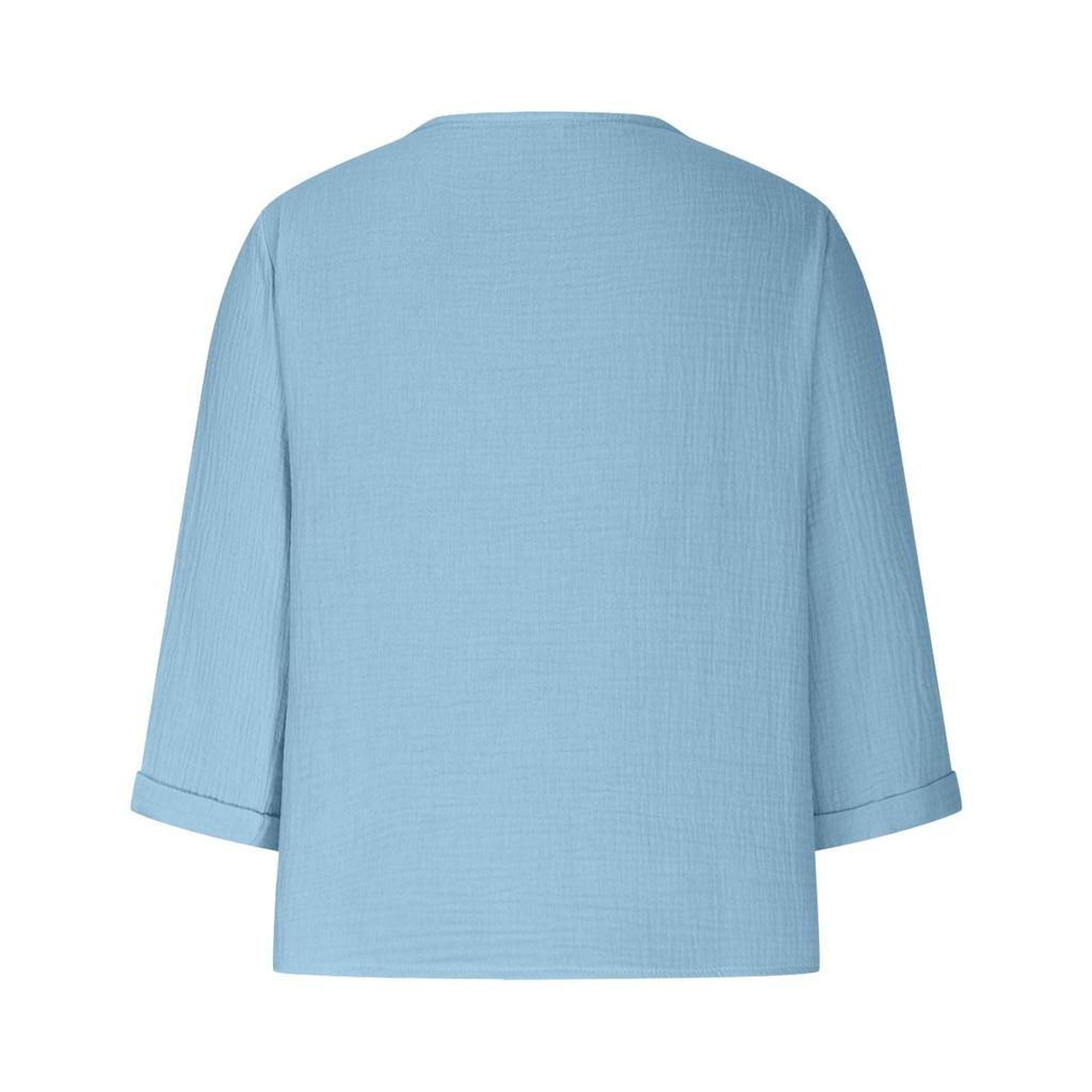 Dámské jednobarevné košile s výstřihem do V jsou módní a elegantní.