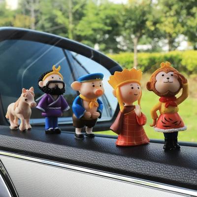 Cesta na západ kreslená panenka auto středová konzola navigační obrazovka dekorace auto malé kreativní ozdoby dekorace zdobí