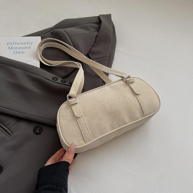 

Корейская нишевая сумка подмышку женская 2025 осень новая мода портативная сумка для боулинга простая большая вместимость сумка на плечо 27*7*13