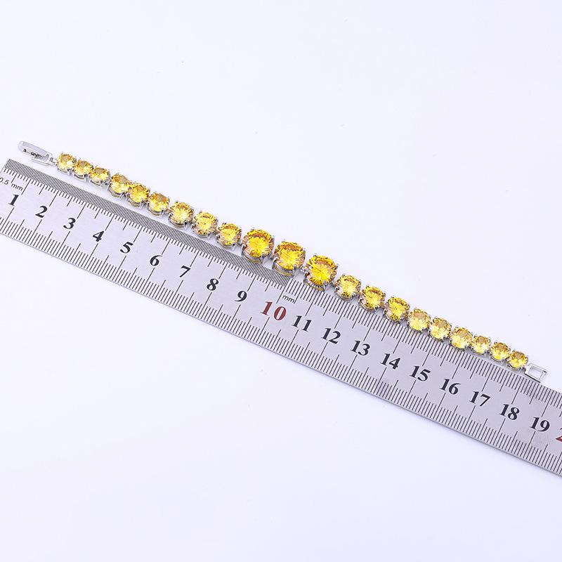 Náramek se zirkony postupné velikosti s měděnou platinou a drahokamy, ručně vyráběné kulaté barevné šperky.