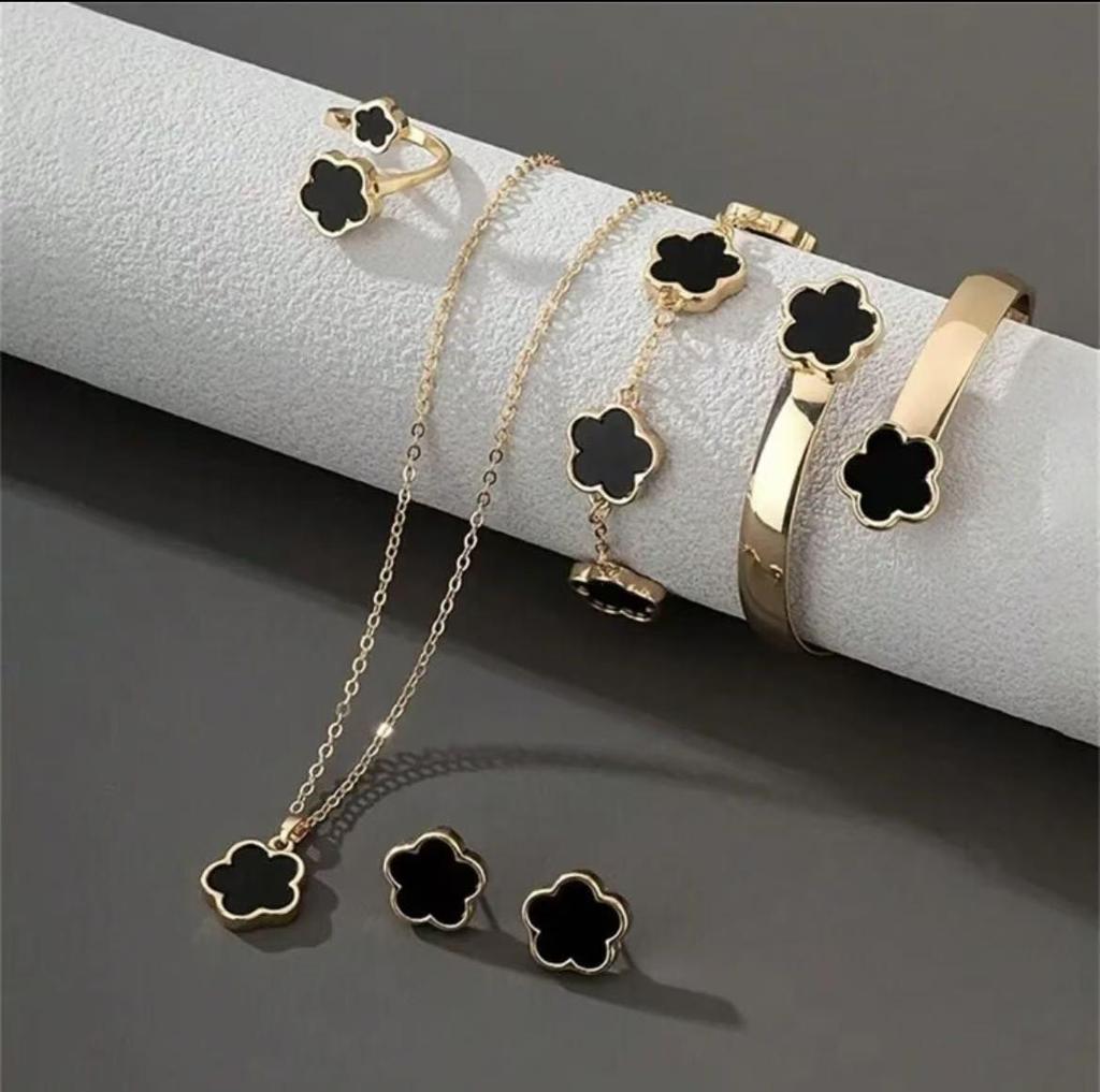 Elegant 5-Piece Flower Jewelry Set: Necklace, Bracelet, Earrings, and Ring.