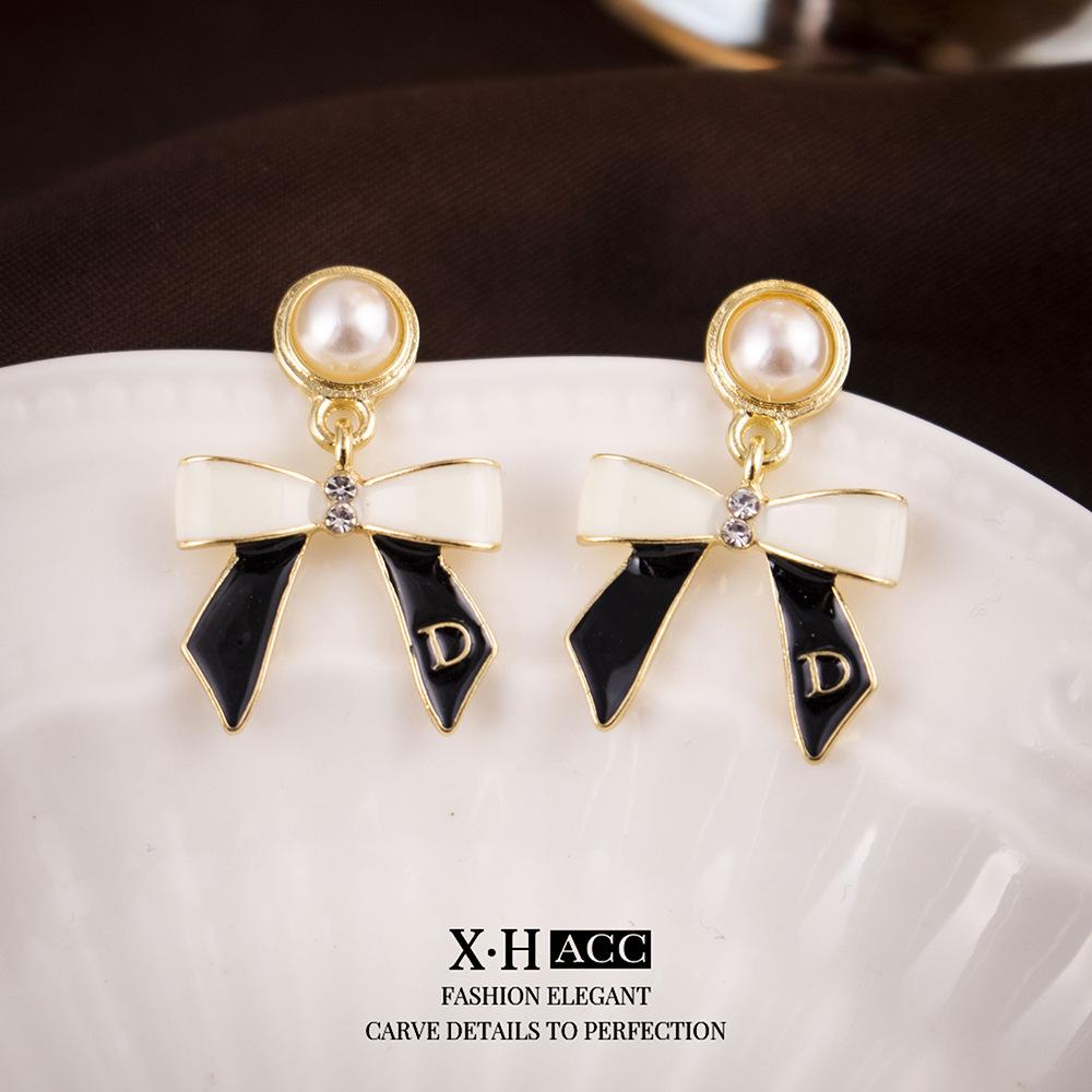 Elegant Gold-Plated Black Zircon Stud Earrings - Niche Design for a Luxurious Fashion Statement