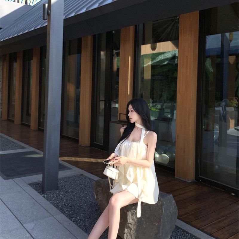 French apricot nail drill suspender dress women's summer ruffle edge loose short skirt design sense pure desire a word skirt