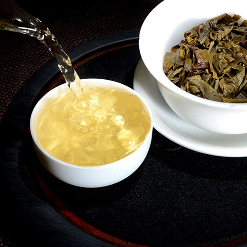 Nyers Puerh Tea 2012 Yiwu Ancient Tree Sheng Puerh préselt tea 250g
