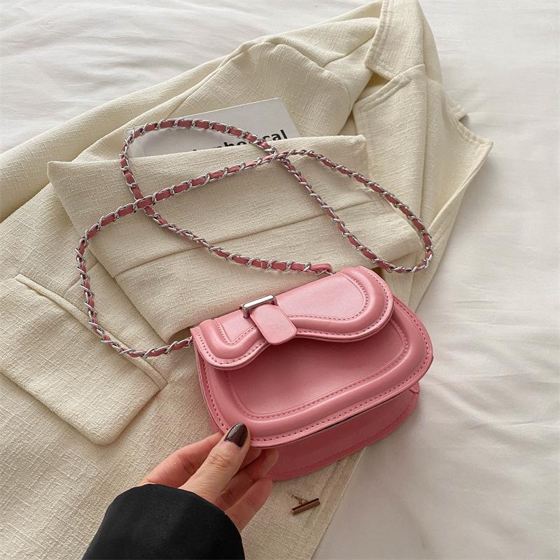 Textura de color sólido moda simple bolso pequeño bolso de cadena para mujer 2025 primavera nuevo versátil ins mensajero bolso de silla de montar