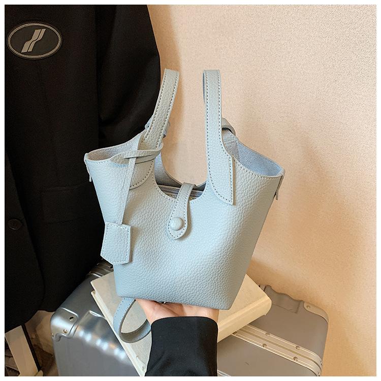 Wholesale 2025 new niche lychee pattern handbag bag women's Korean version simple bucket bag casual messenger bag