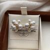 Three-dimensional full pearl flower stud earrings French retro light luxury high fashion temperament versatile elegant earrings