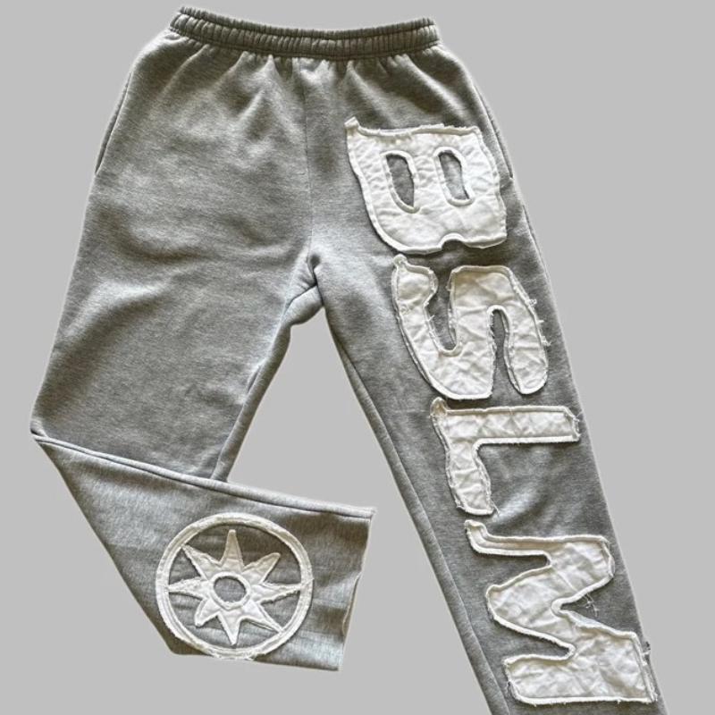 Pantaloni casual alla moda personalizzati street hip-hop con ricamo di lettere autunnali e invernali europei e americani per uomo e donna