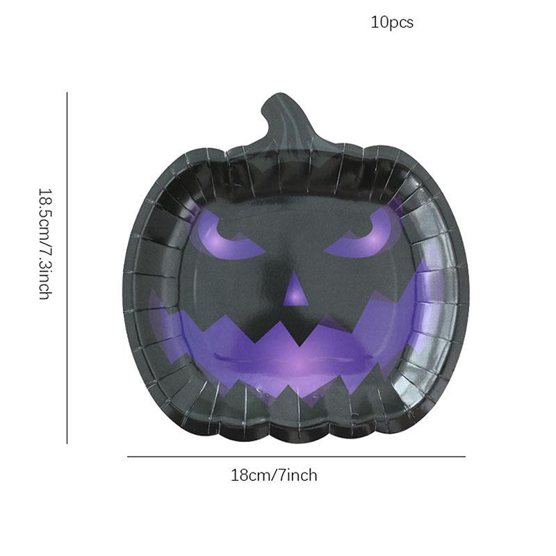 Zestaw zastawy stołowej na imprezę tematyczną Halloween: Obrus dyniowy, Talerzyki i kubki jednorazowe