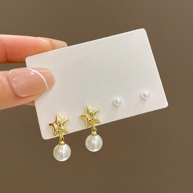

Two pairs of pearl star earrings women s mini versatile temperament set earrings New Internet celebrity ear jewelry