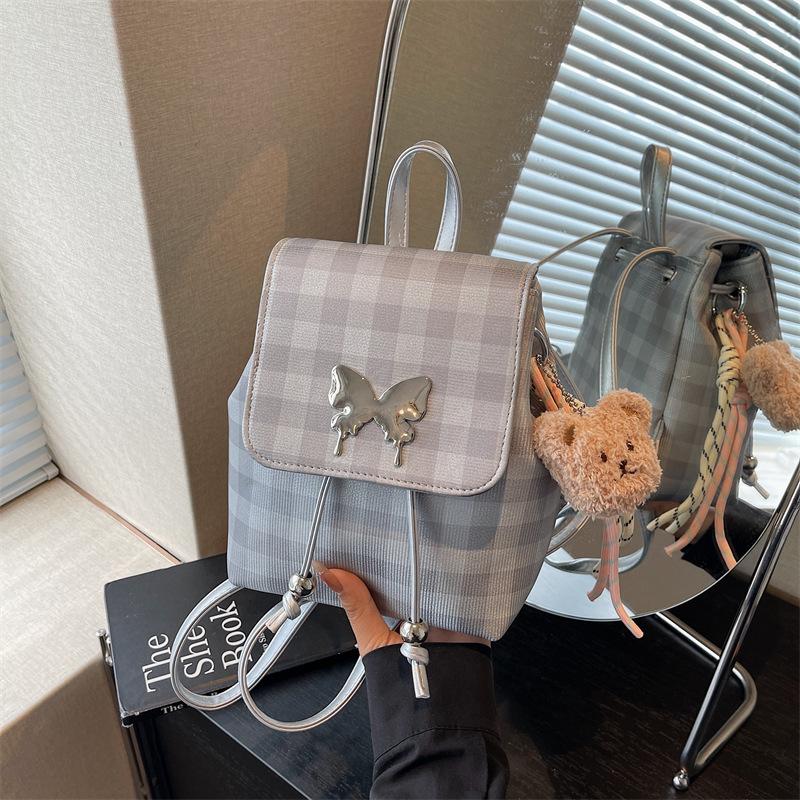 Plaid backpack female fashion niche student class schoolbag bucket bag high value travel small backpack
