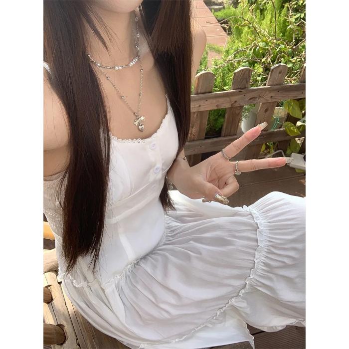 Two-piece suit women's splicing gentle suspender dress women's summer new vacation style seaside fringed blouse