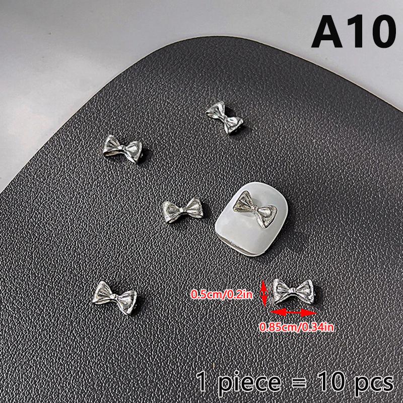 10 ks Jednoduché Tenké Mašličky Stříbrné Kroucené Slitiny Ozdoby na Nehty Manicura Přívěsky