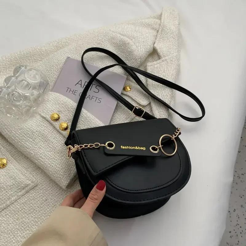 Dámské sedlové tašky crossbody tašky nové messenger tašky řetízkové klopové tašky přes rameno jednobarevná designová luxusní crossbody taška