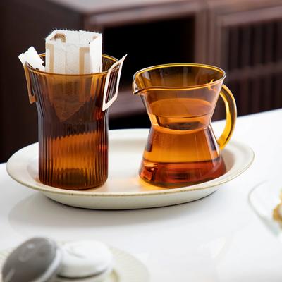 Boccale da latte in vetro ambrato con manico Piccola bottiglia da latte Tazza da caffè in vetro resistente al calore Pentola per preparare il caffè da condividere