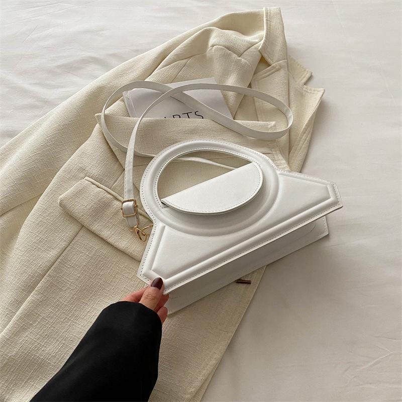 

Стильная портативная маленькая квадратная сумка с кольцом высокой текстуры 2025 новая, универсальная сумка через плечо, сумка-мессенджер, женская сумка, тренд белый