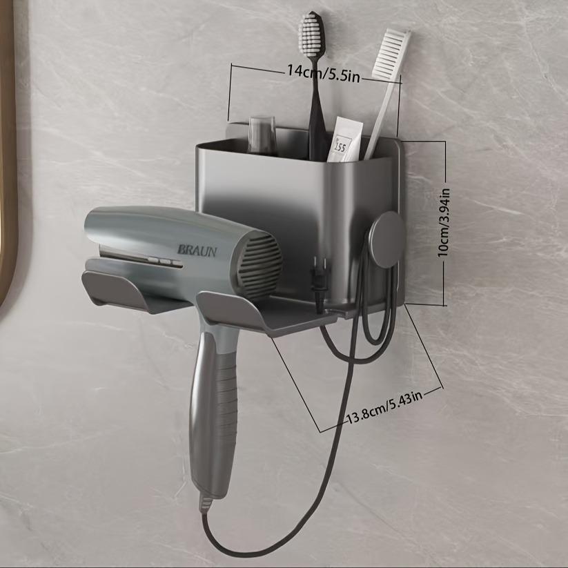 

In-Stock No-Punch Wall-Mounted Hair Dryer Holder with Wind Nozzle and Bathroom Vanity Shelf for Toothpaste and Comb Storage.