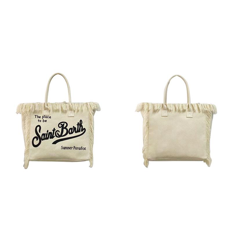 Large Capacity Canvas Tote Bag with Denim Fabric and Tassel Design for Commuting