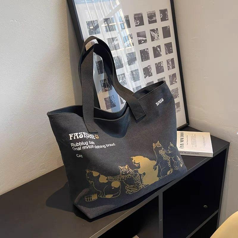 

New large-capacity solid color simple canvas bag women s 2026 Korean versi fashi shoulder bag Japanese simple portable tote