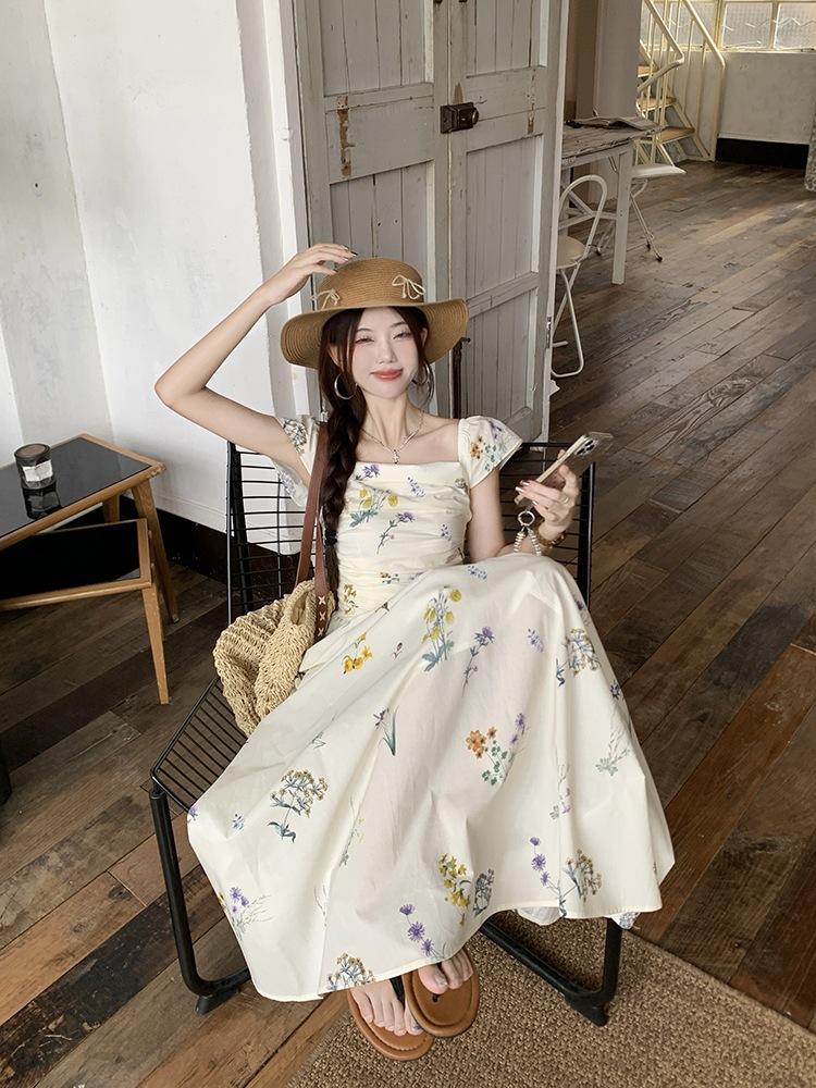 Xiaofei Sleeve Square Neck Floral Dress Children's Summer 2026 New Seaside Vacation Coffee Break French Temperament Long Dress