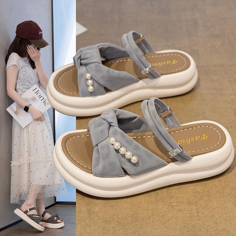 Thick-bottomed cool slippers female 2025 summer new fairy wind outside wear Internet celebrity versatile pearl bow word slippers