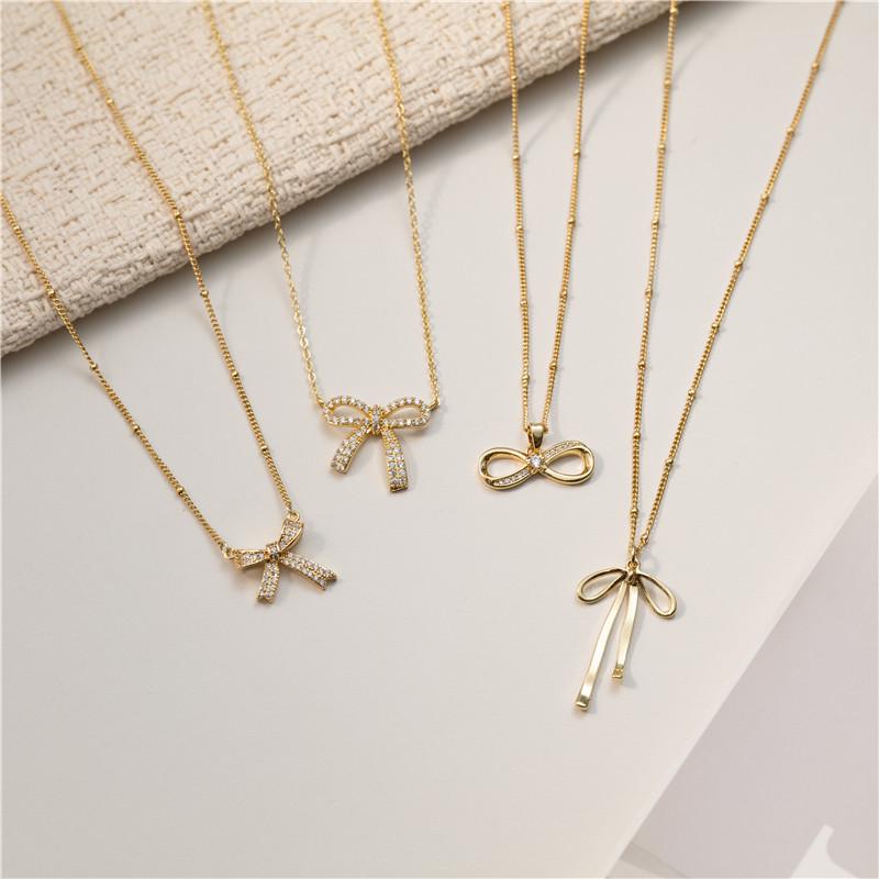 18K Gold Zircon Copper Bow Necklace with Full Diamond Clavicle Chain